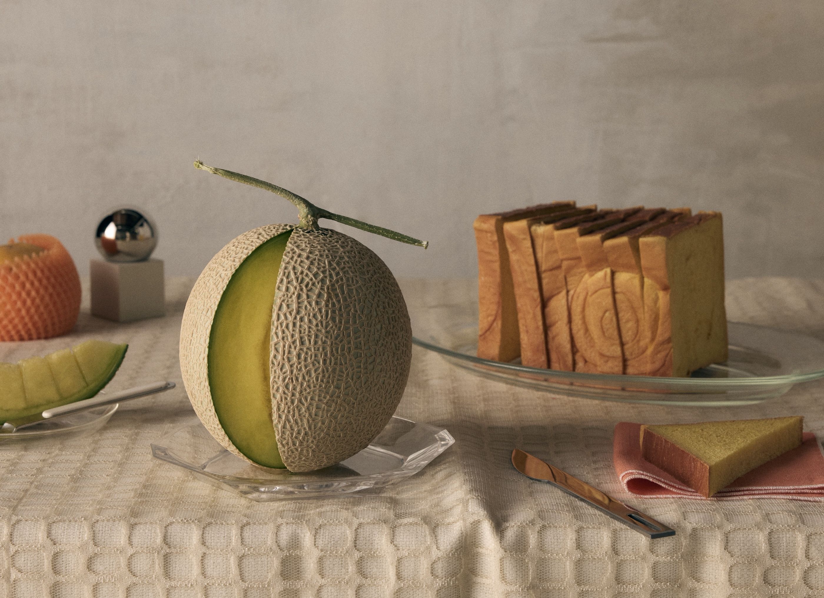A cantaloupe melon with a slice removed, next to stacked bread and fruit on a table setting.